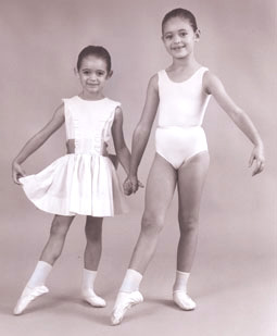 Two girls in ballet pose
